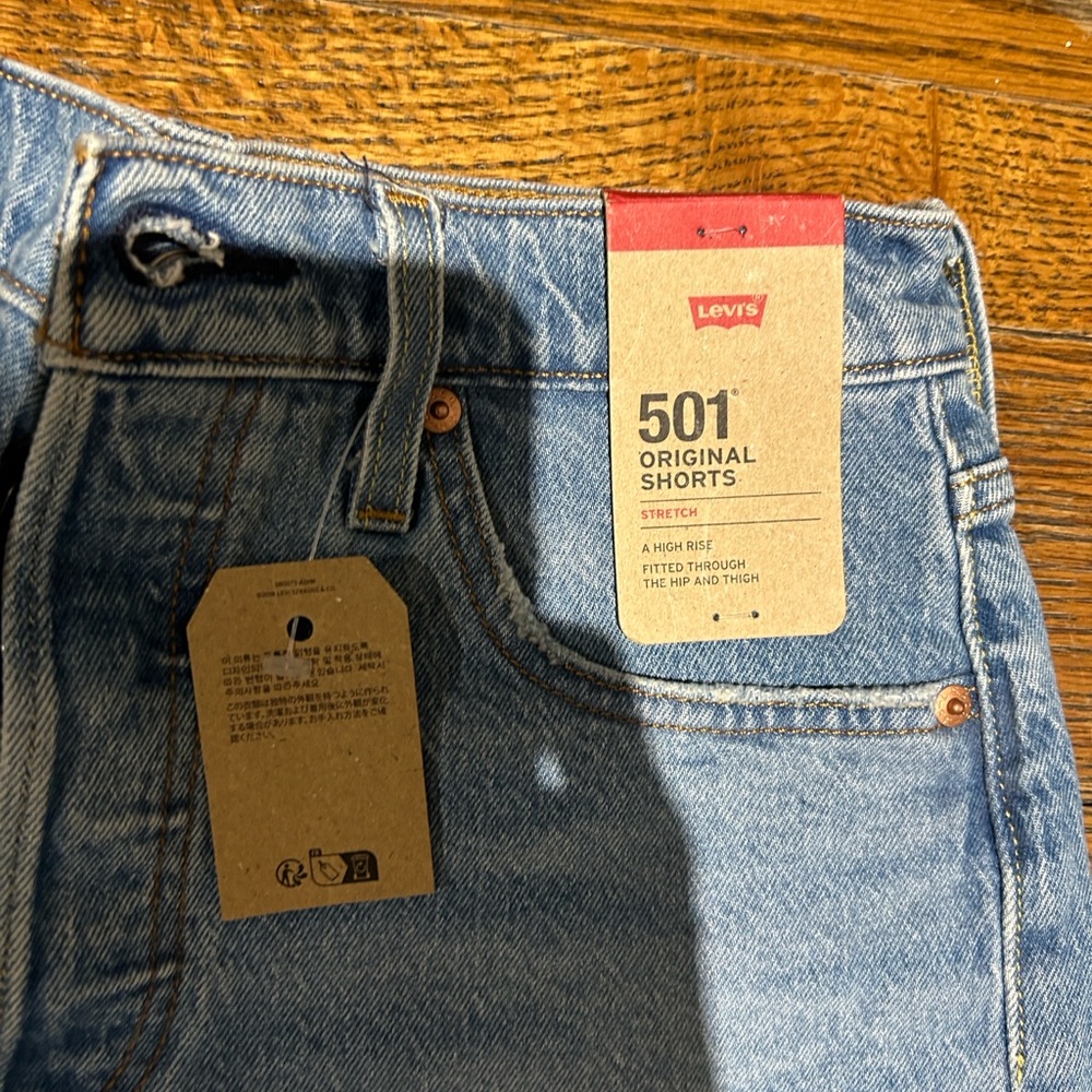 Levi's Women's Distressed Blue Jean Shorts - Picture 3 of 9